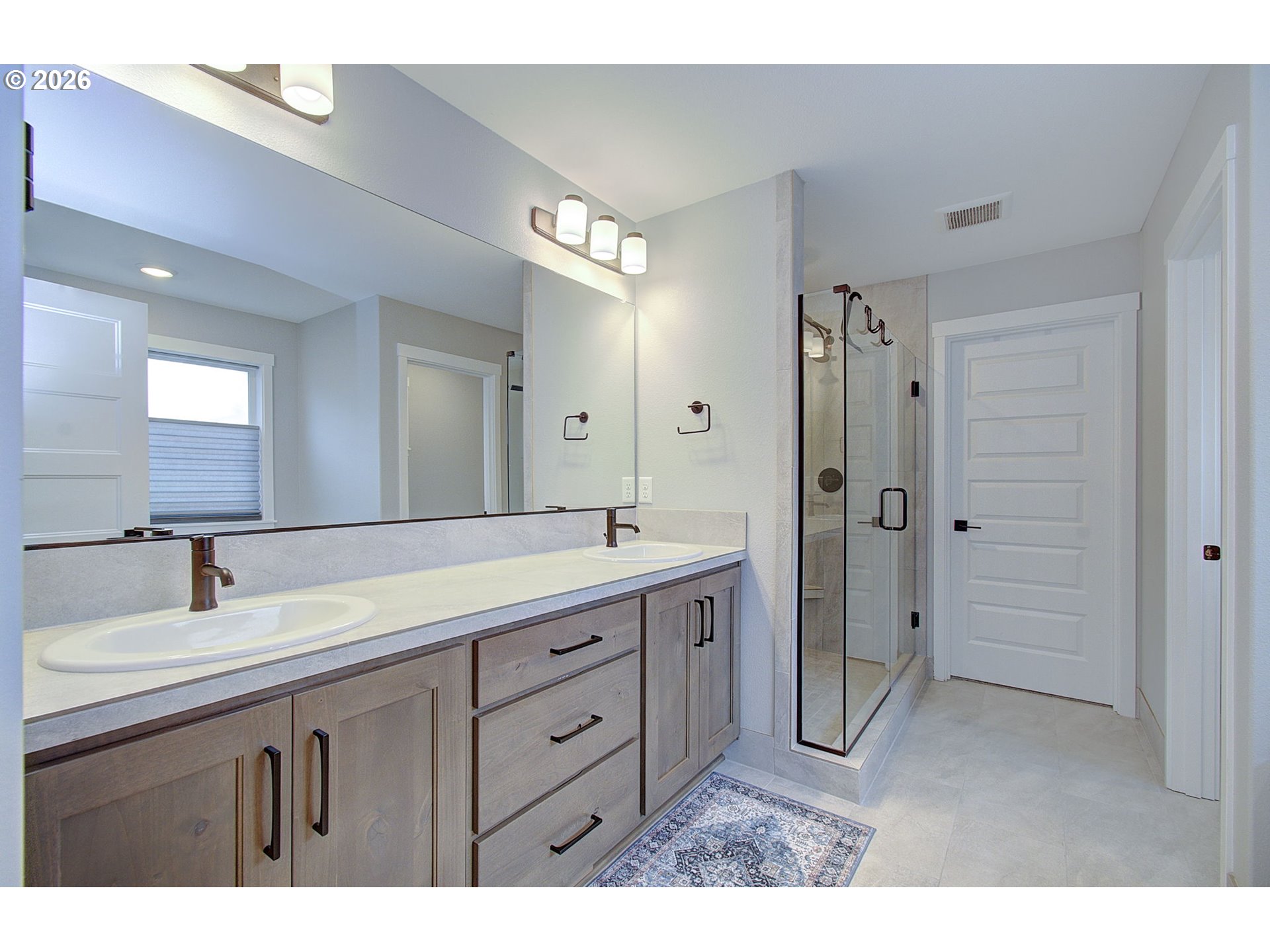 2831 Northeast 9th Avenue Battle Ground, WA 98604 - Photo 31 of 43 a bathroom with a granite countertop sink mirror and double