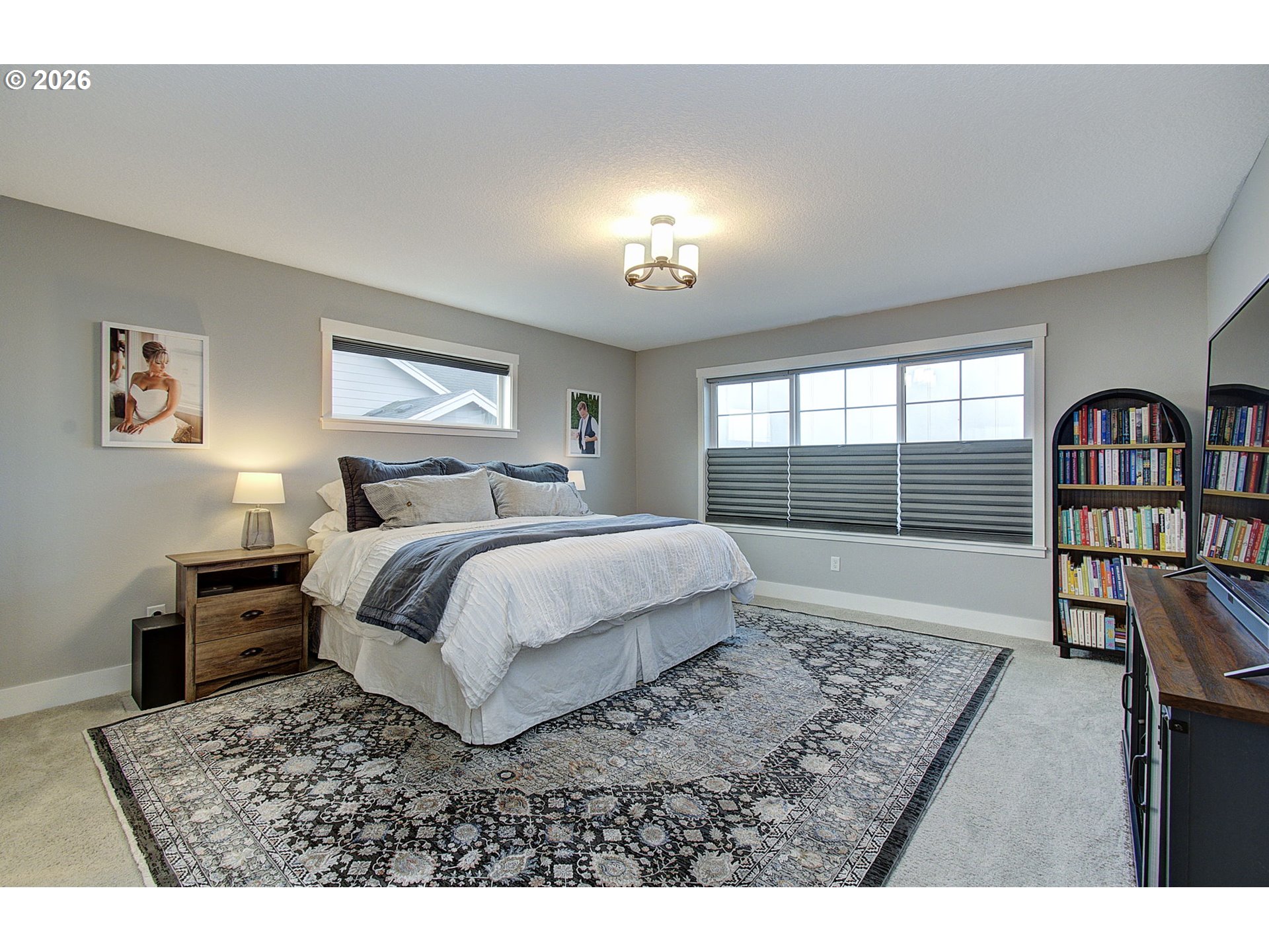 2831 Northeast 9th Avenue Battle Ground, WA 98604 - Photo 33 of 43 a bedroom with a large bed and a window