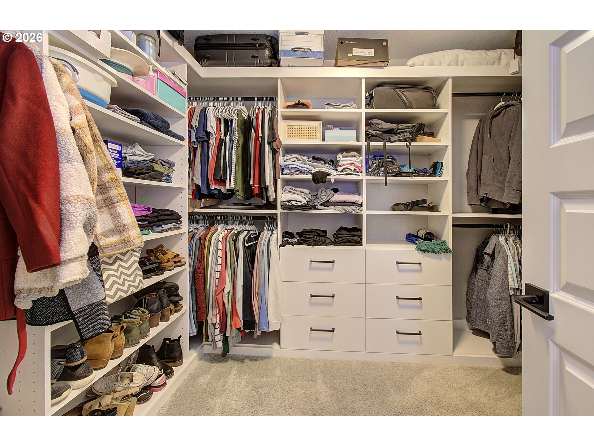 2831 Northeast 9th Avenue Battle Ground, WA 98604 - Photo 35 of 43 a view of walk in closet with clothes and shoes