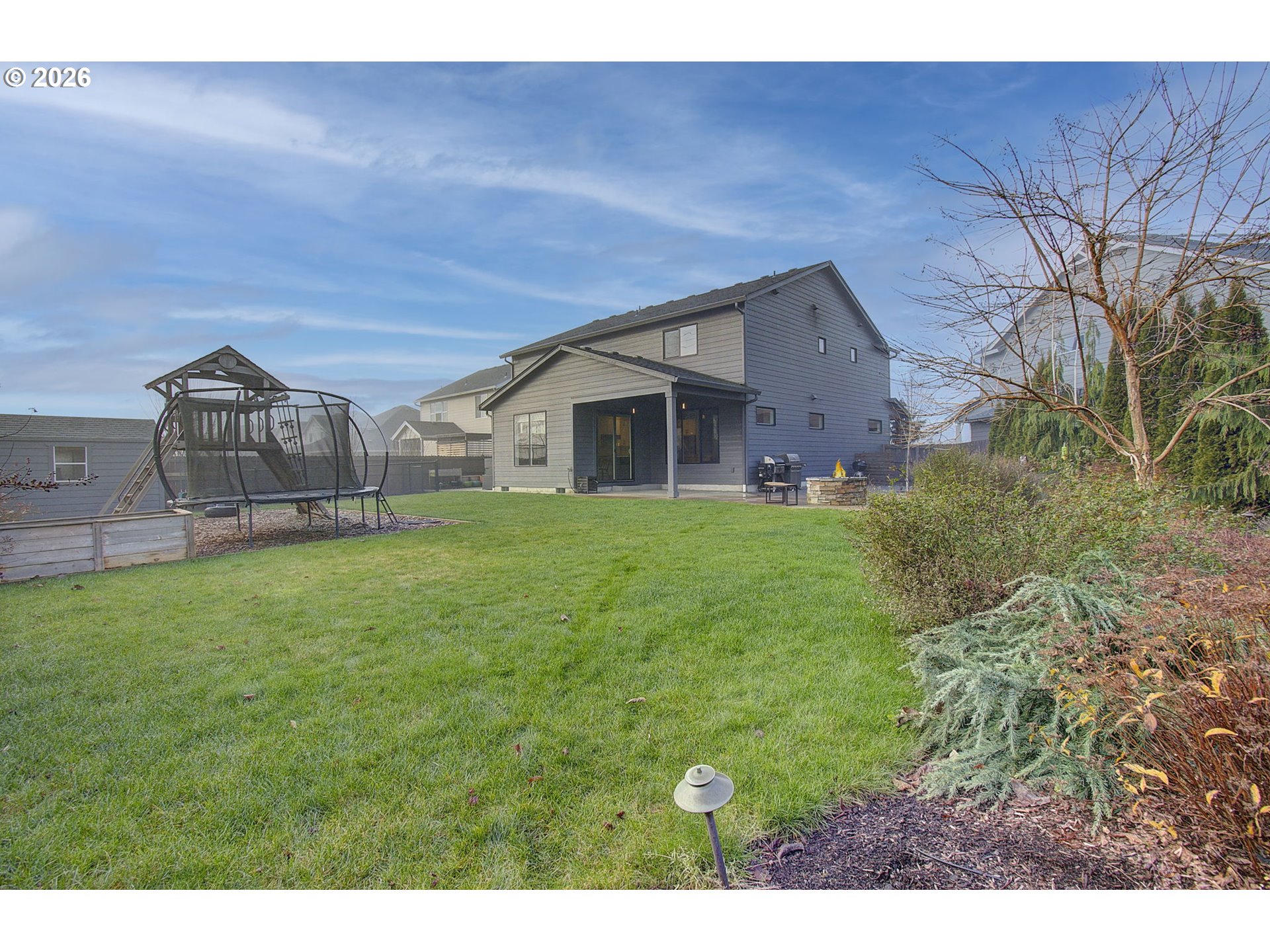 2831 Northeast 9th Avenue Battle Ground, WA 98604 - Photo 37 of 43 a view of a house with a backyard