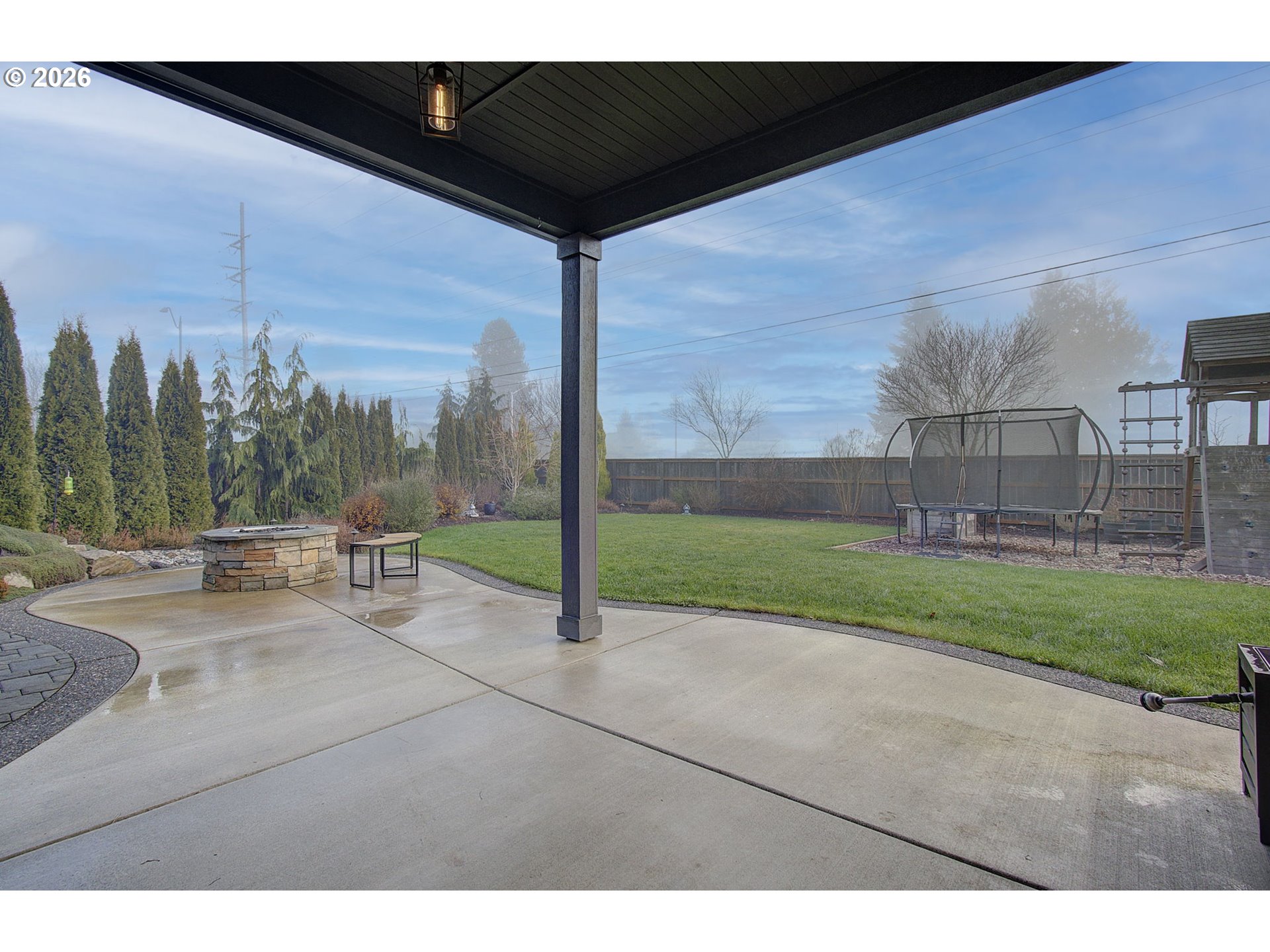 2831 Northeast 9th Avenue Battle Ground, WA 98604 - Photo 39 of 43 a view of a backyard with couches and wooden fence