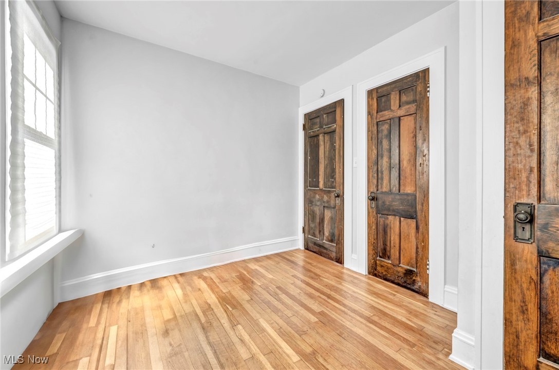3403 Henderson Road Cleveland, OH 44112 - Photo 21 of 33 Unfurnished room featuring light wood-type flooring