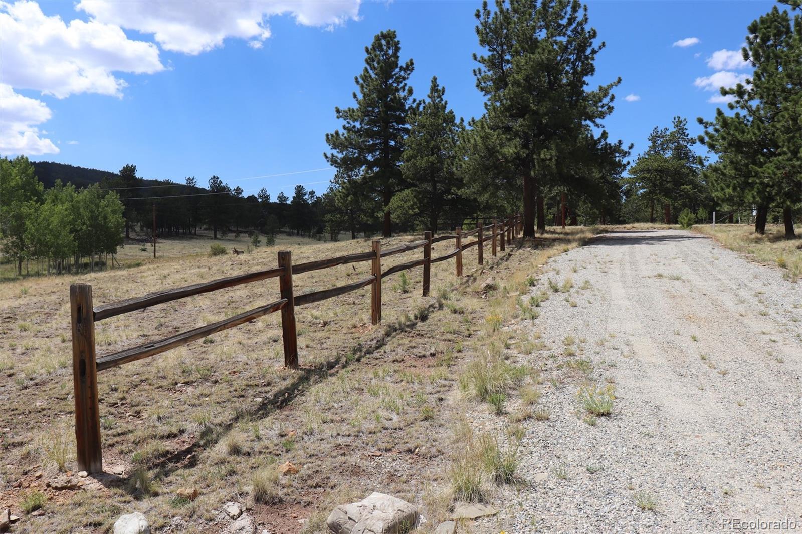 2026 Singletree Road Hartsel, CO 80449 - Photo 8 of 24 a view of small yard with wooden fence
