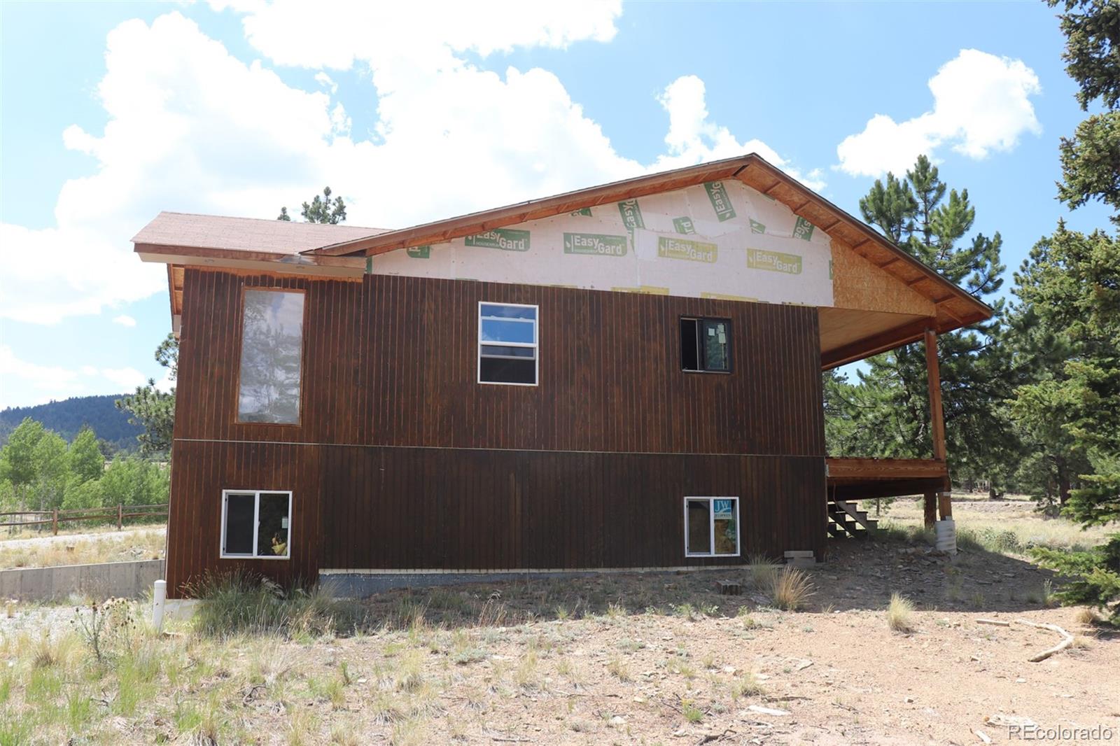 2026 Singletree Road Hartsel, CO 80449 - Photo 9 of 24 a view of a house with a yard