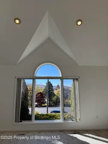 a kitchen with a sink and a stove top oven