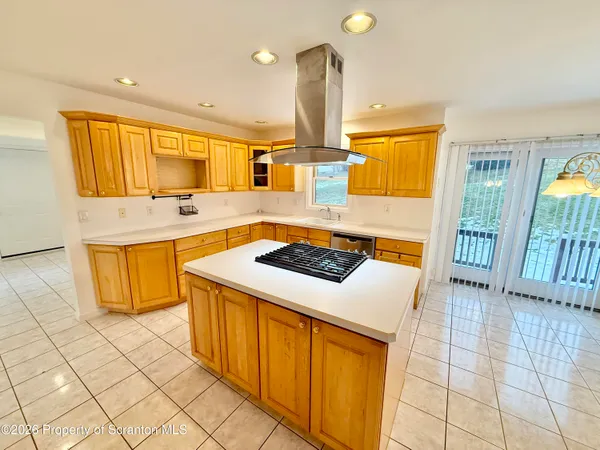 a view of a garden with an outdoor space