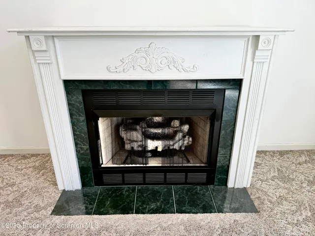 a spacious bathroom with a tub sink and mirror