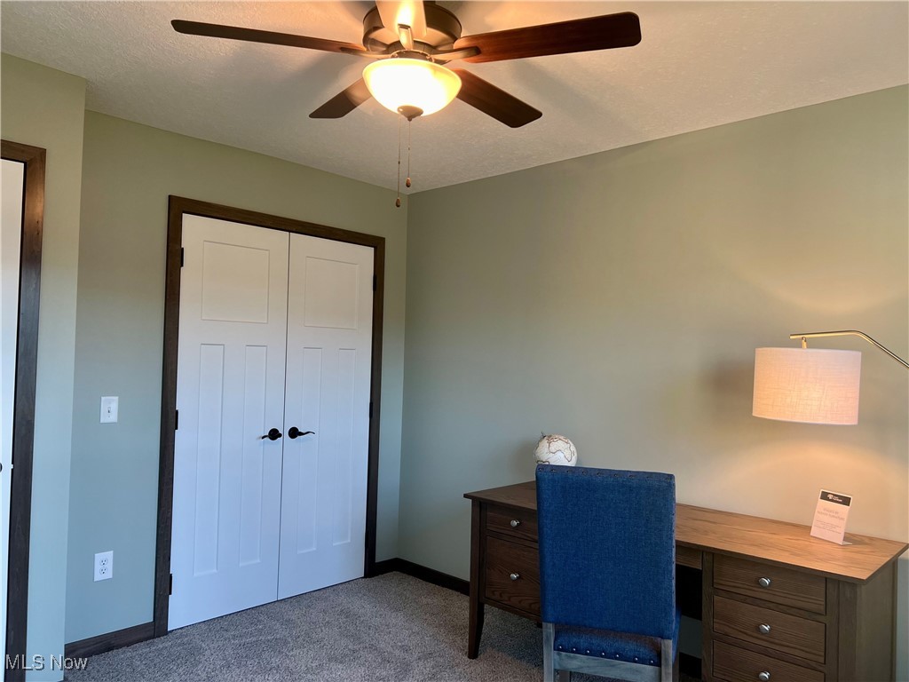 5531 Innkeeper Street Southeast Dennison, OH 44621 - Photo 23 of 30 Carpeted office featuring ceiling fan and a textured ceiling