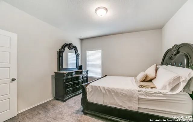 a room with furniture and a window