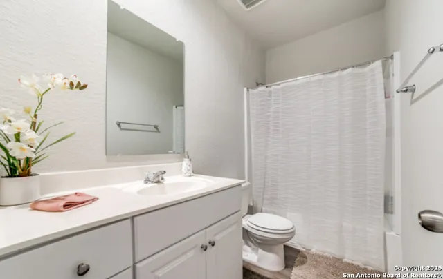 a workspace with furniture and a window