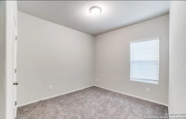 a view of a terrace with chairs