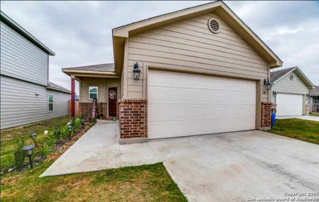 a living room with furniture fireplace and flat screen tv