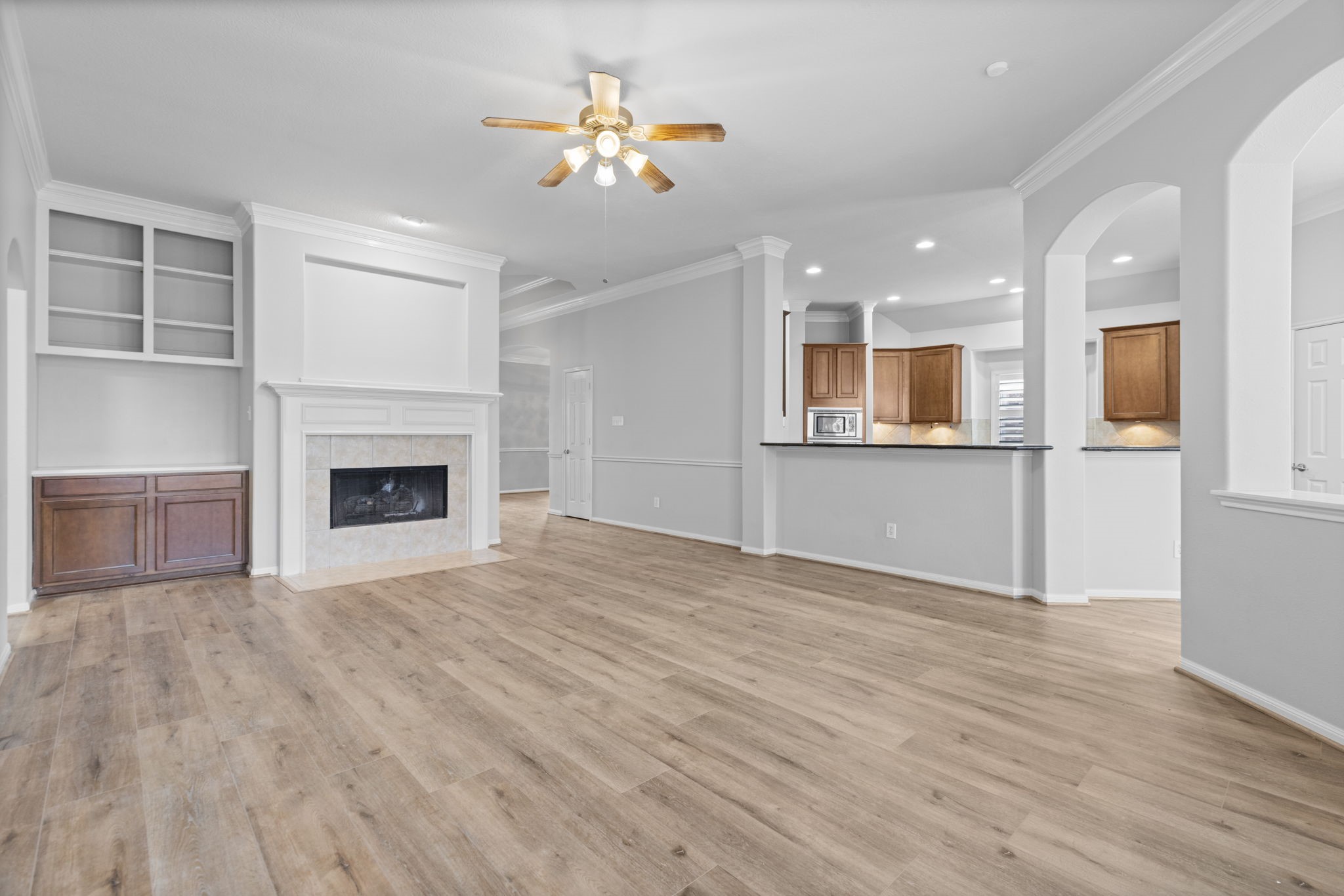 6515 Pine Arrow Court Spring, TX 77389 - Photo 12 of 31 Enjoy quiet nights by the fireplace! This open concept home is great for entertaining.