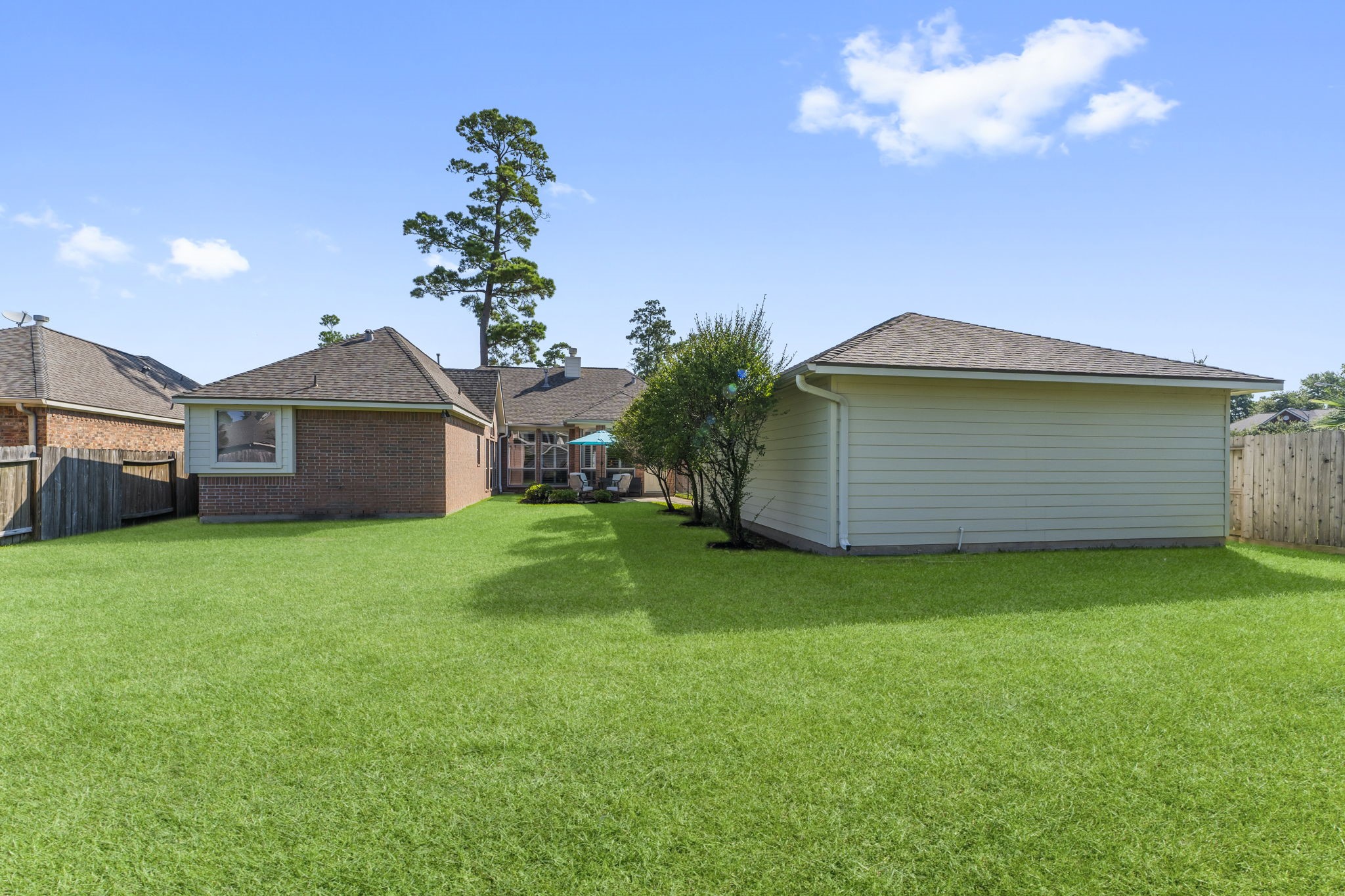 6515 Pine Arrow Court Spring, TX 77389 - Photo 27 of 31 a backyard of a house with lots of green space