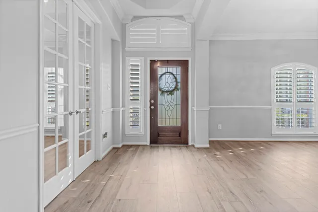 a view of a kitchen with kitchen island wooden floor and center island