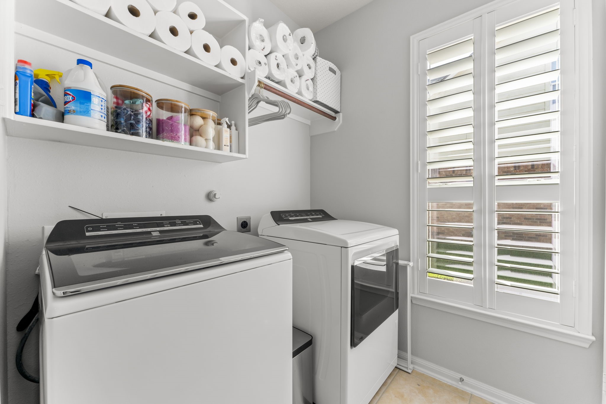 6515 Pine Arrow Court Spring, TX 77389 - Photo 8 of 31 Utility room is located near the kitchen. There is also a storage closet in this room.
