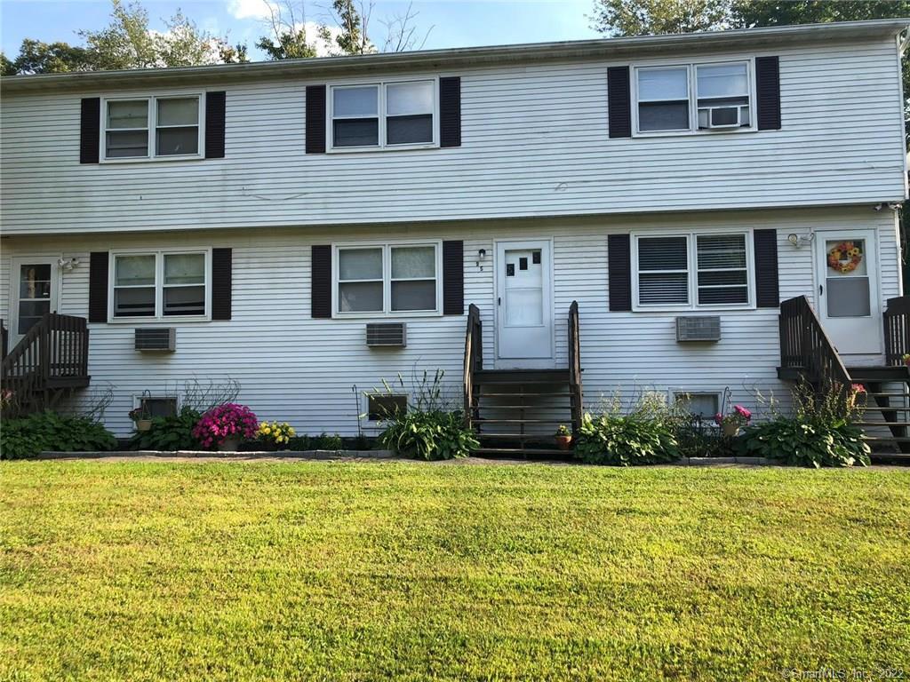 a front view of house with yard
