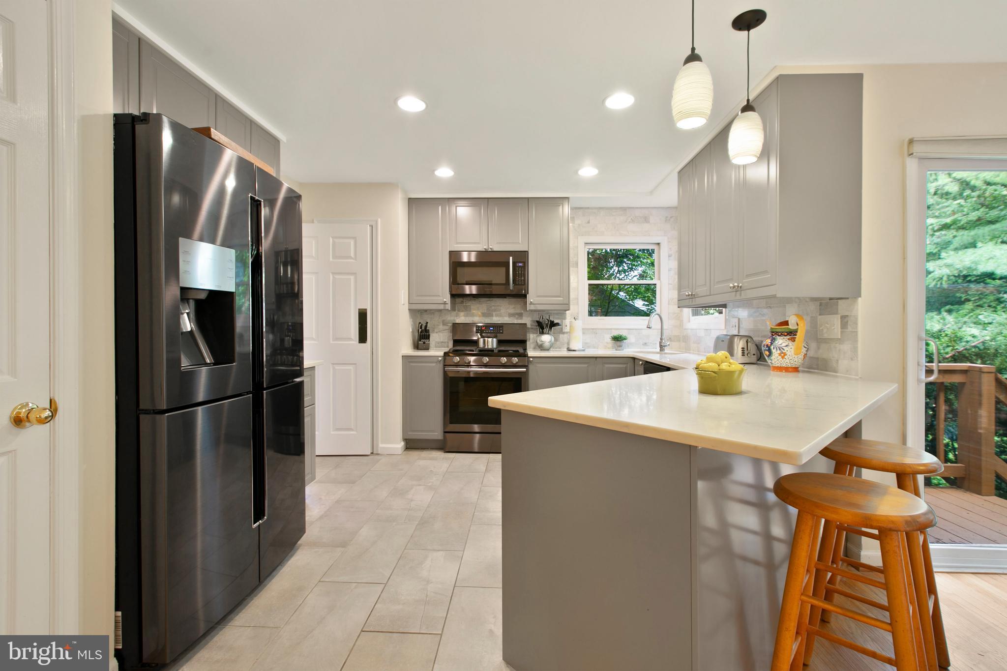 5814 Pimlico Road Baltimore, MD 21209 - Photo 13 of 58 Quartz Countertops and Stainless Steel Appliances