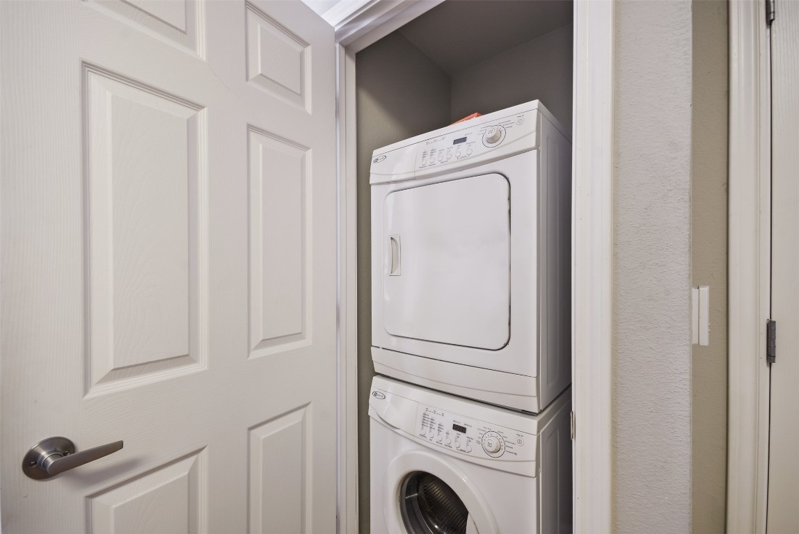 2502 Leon Street, Unit 313 Austin, TX 78705 - Photo 12 of 27 a utility room with dryer and washer