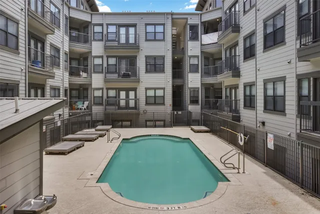 a view of balcony with a small pool