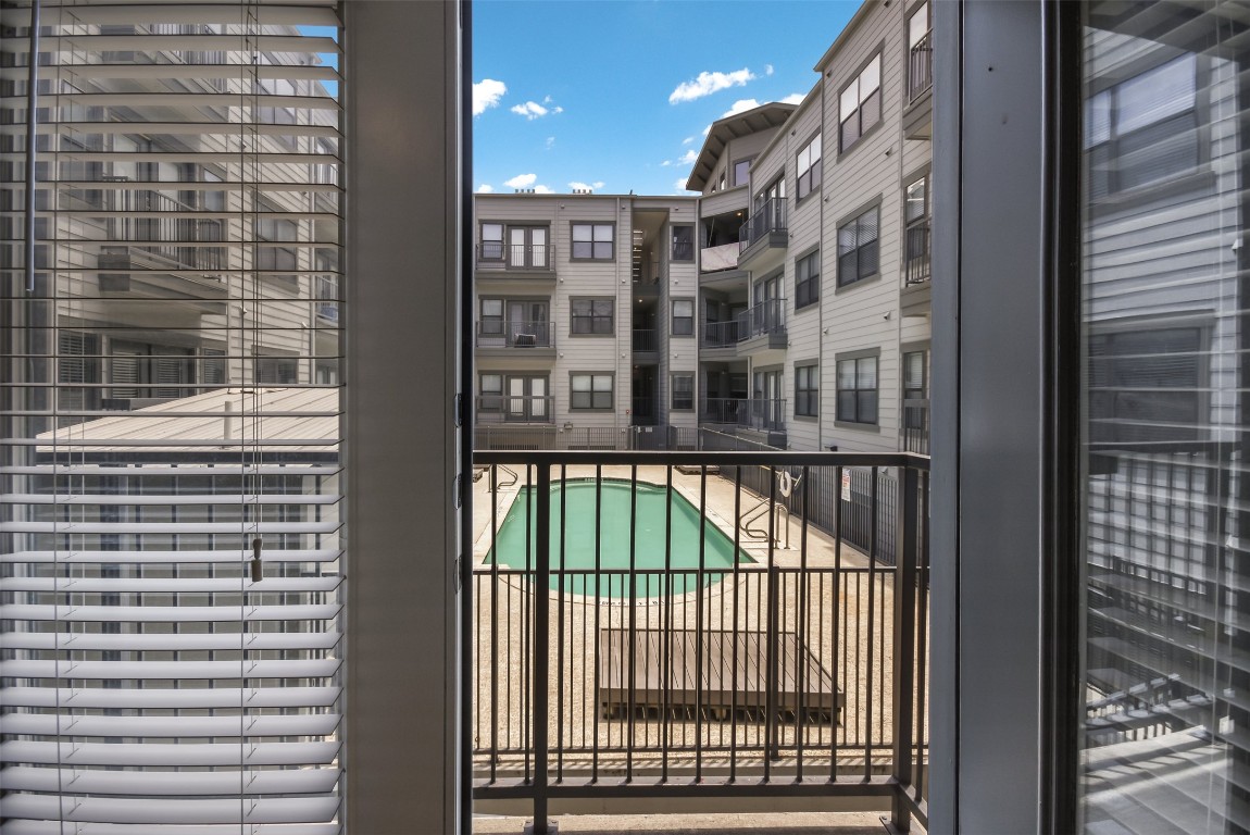 2502 Leon Street, Unit 313 Austin, TX 78705 - Photo 22 of 27 a view of balcony with a small pool