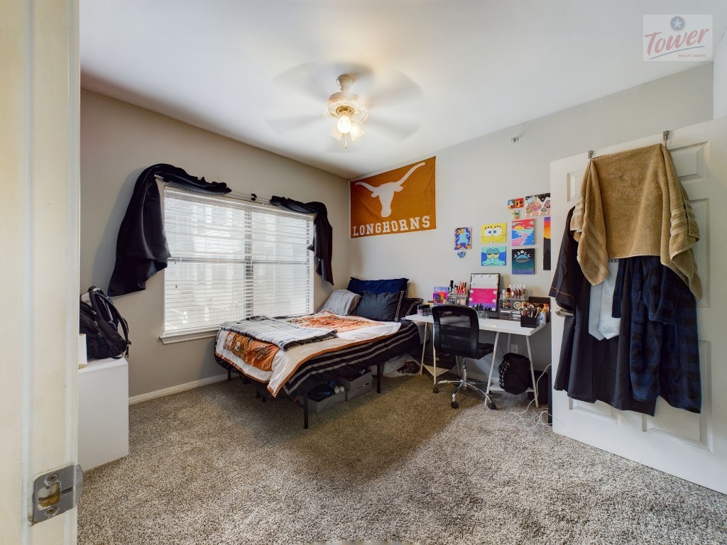 2502 Leon Street, Unit 313 Austin, TX 78705 - Photo 5 of 27 a living room with furniture and a window