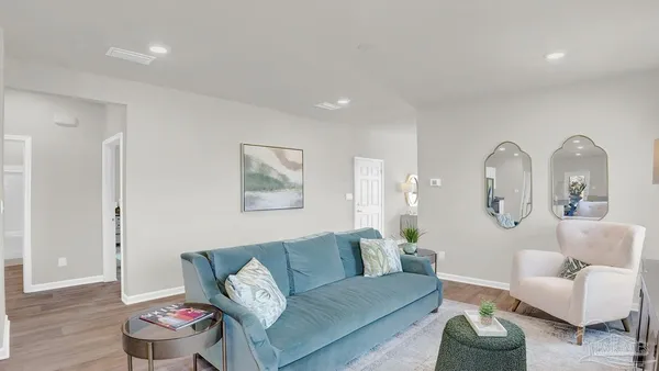 a living room with furniture and a couch