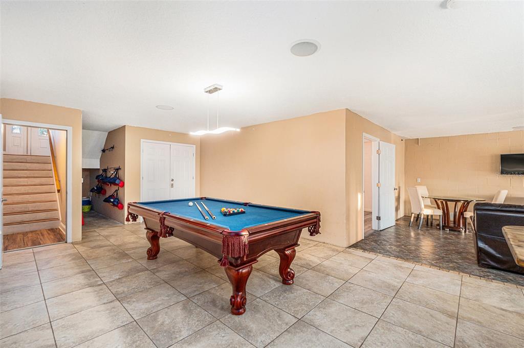 1316 Apollo Beach Boulevard South Apollo Beach, FL 33572 - Photo 17 of 47 a room with furniture pool table and windows