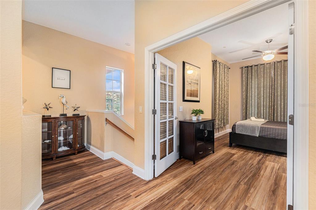 1316 Apollo Beach Boulevard South Apollo Beach, FL 33572 - Photo 24 of 47 a living room with furniture and a wooden floor