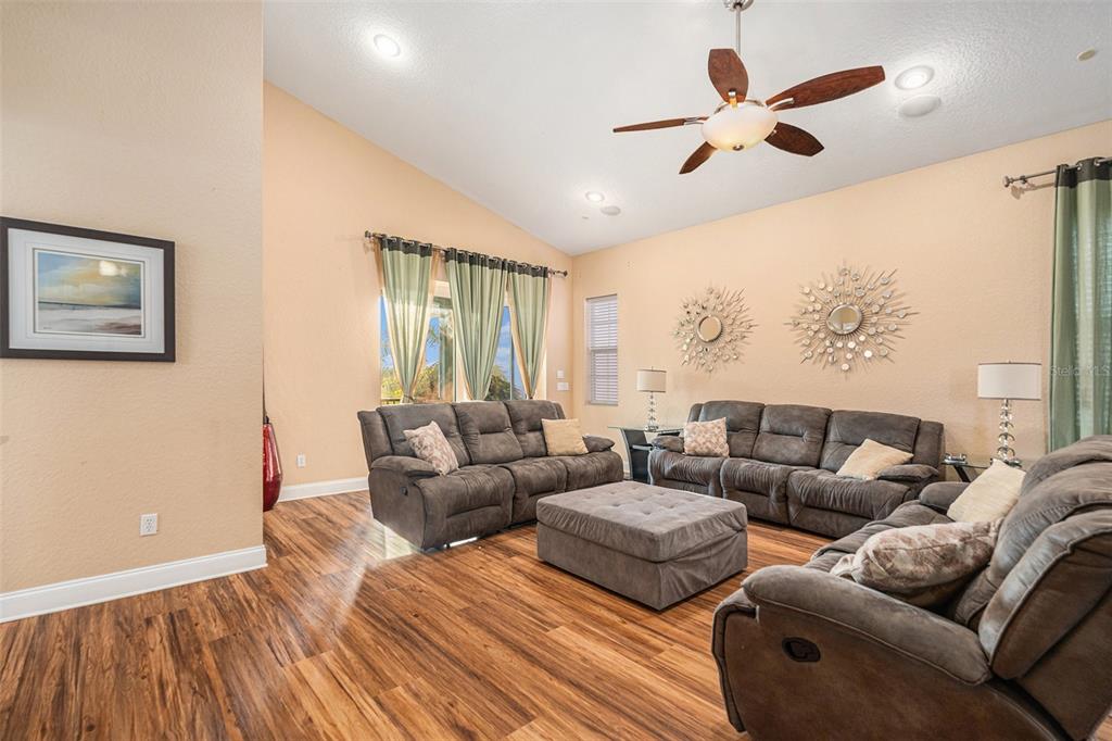 1316 Apollo Beach Boulevard South Apollo Beach, FL 33572 - Photo 25 of 47 a living room with furniture and a large window