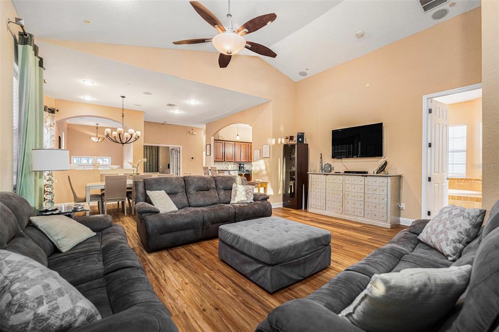 1316 Apollo Beach Boulevard South Apollo Beach, FL 33572 - Photo 26 of 47 a living room with furniture and a flat screen tv