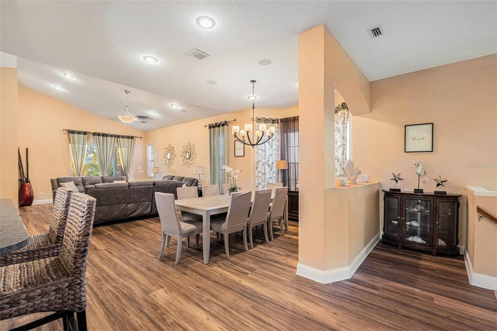 1316 Apollo Beach Boulevard South Apollo Beach, FL 33572 - Photo 28 of 47 a view of a dining room with furniture window and wooden floor