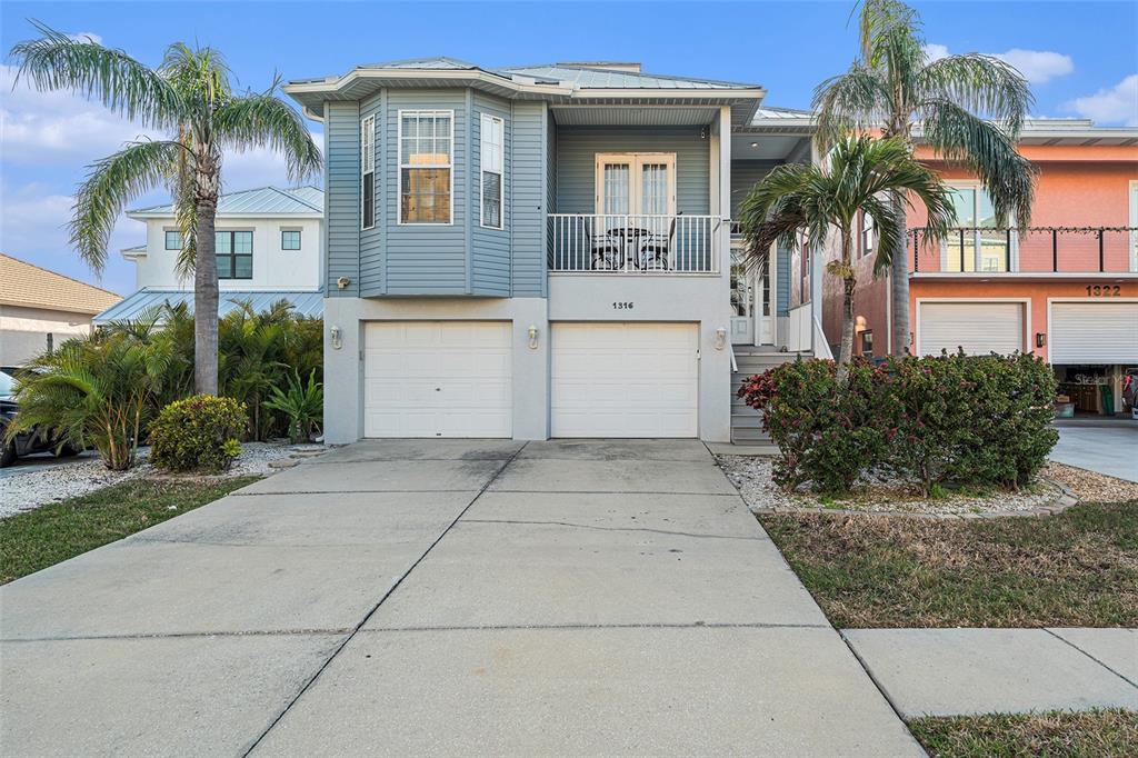 1316 Apollo Beach Boulevard South Apollo Beach, FL 33572 - Photo 47 of 47 a front view of a house with a yard