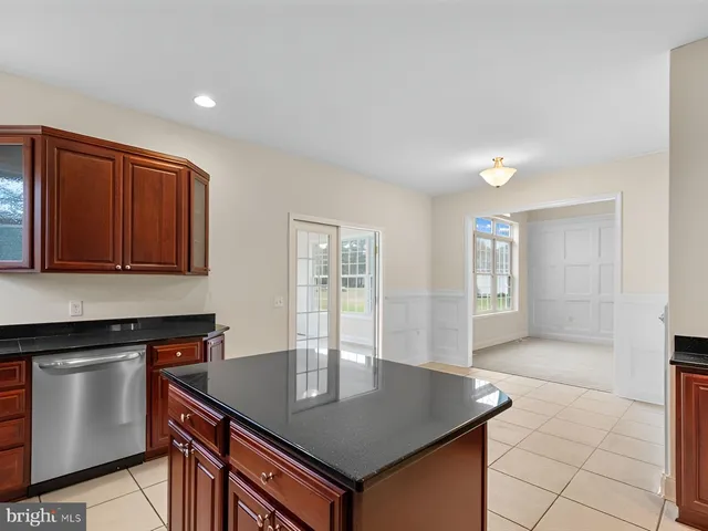 a view of an empty room with windows