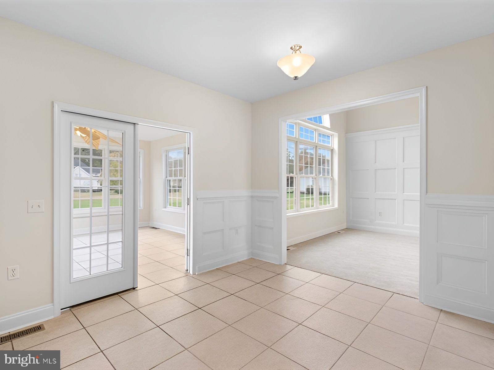3236 Noble Farm Road Eden, MD 21822 - Photo 19 of 57 a view of an empty room with windows
