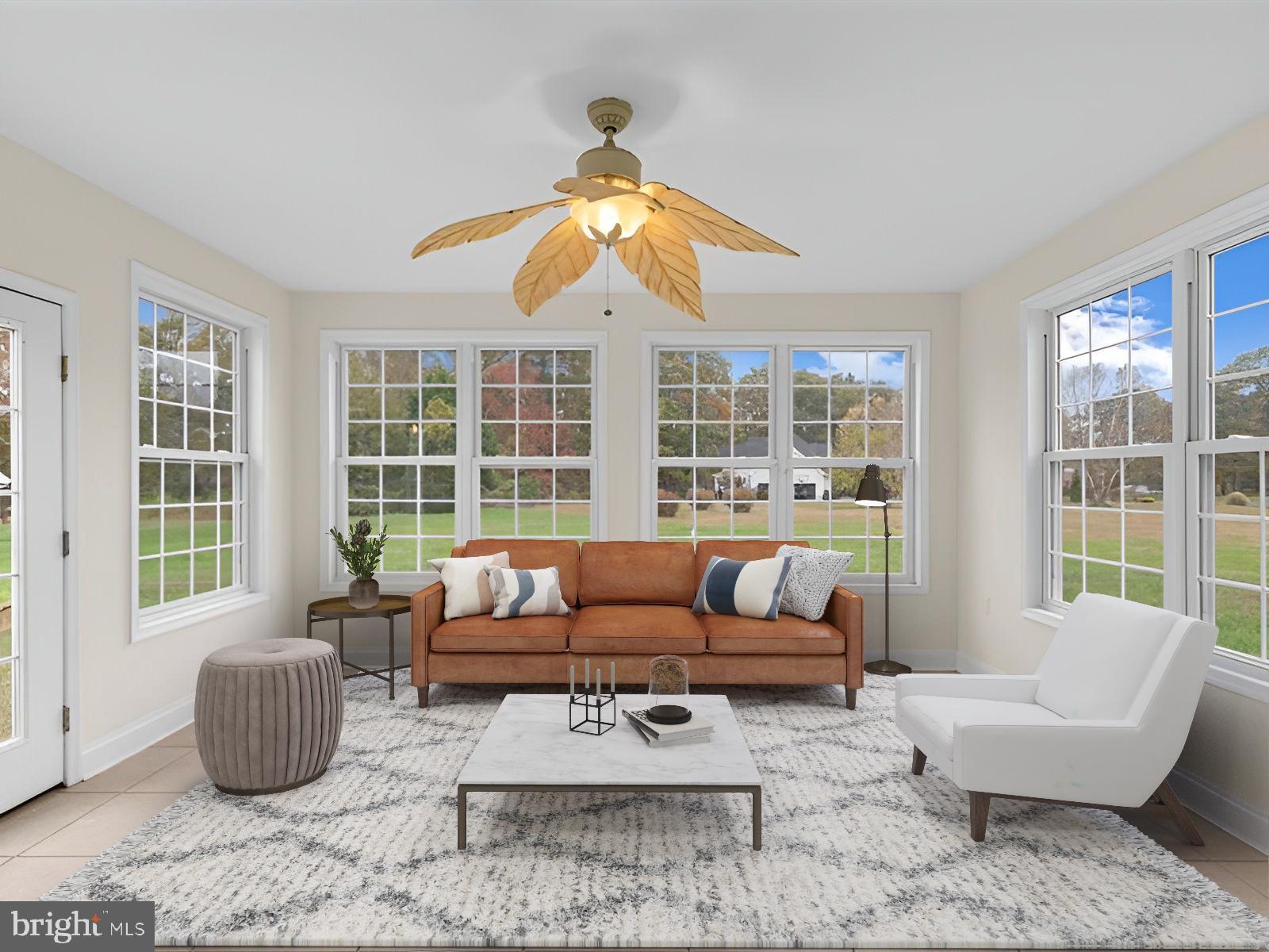3236 Noble Farm Road Eden, MD 21822 - Photo 21 of 57 a living room with furniture and a large window