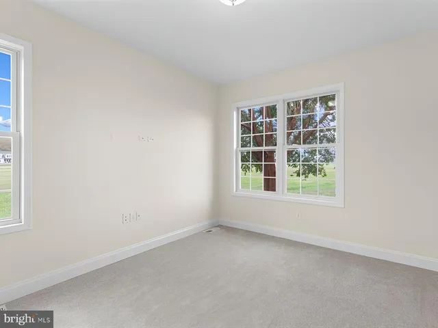 a workspace with furniture and window