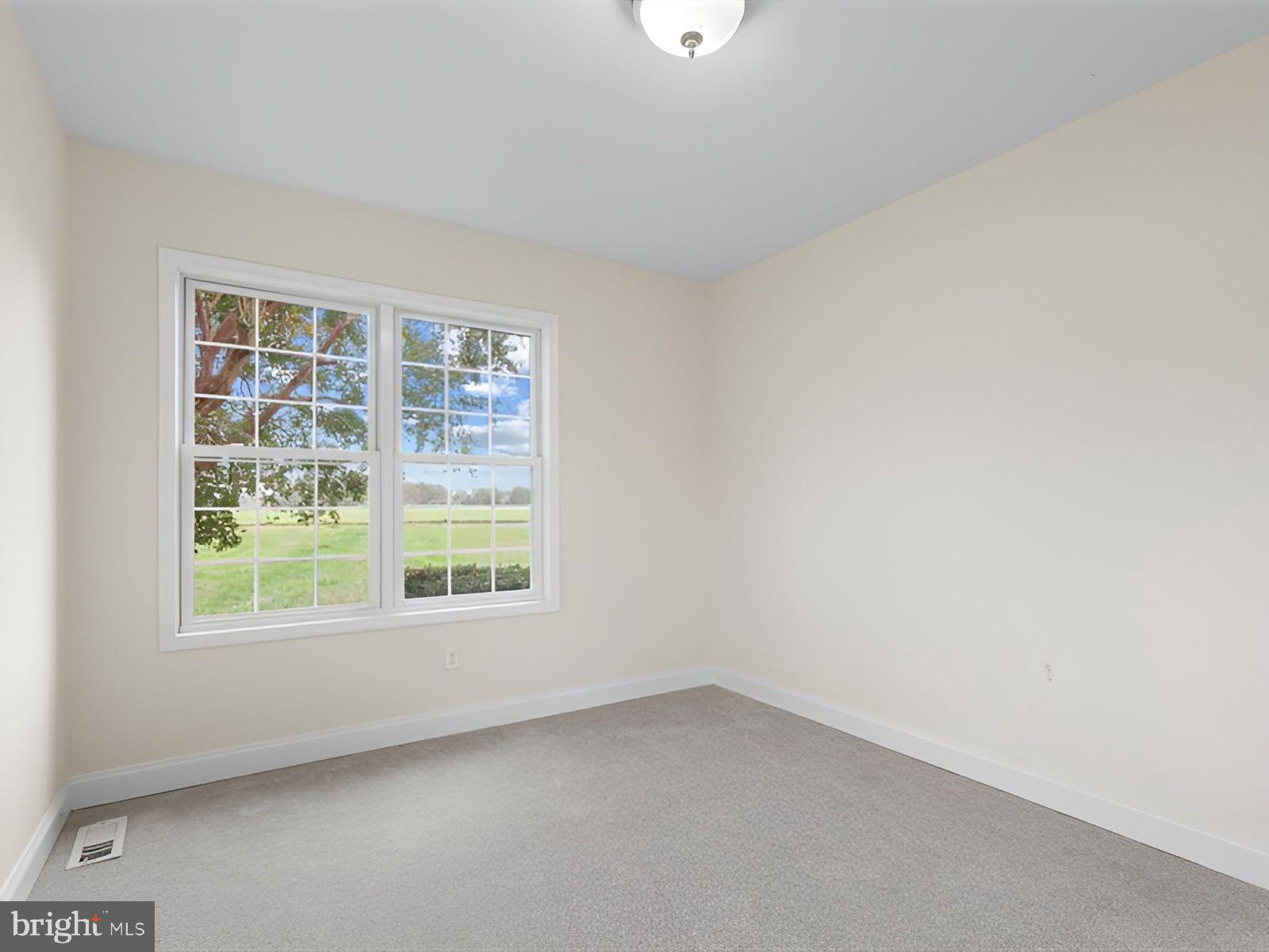 3236 Noble Farm Road Eden, MD 21822 - Photo 27 of 57 an empty room with a window