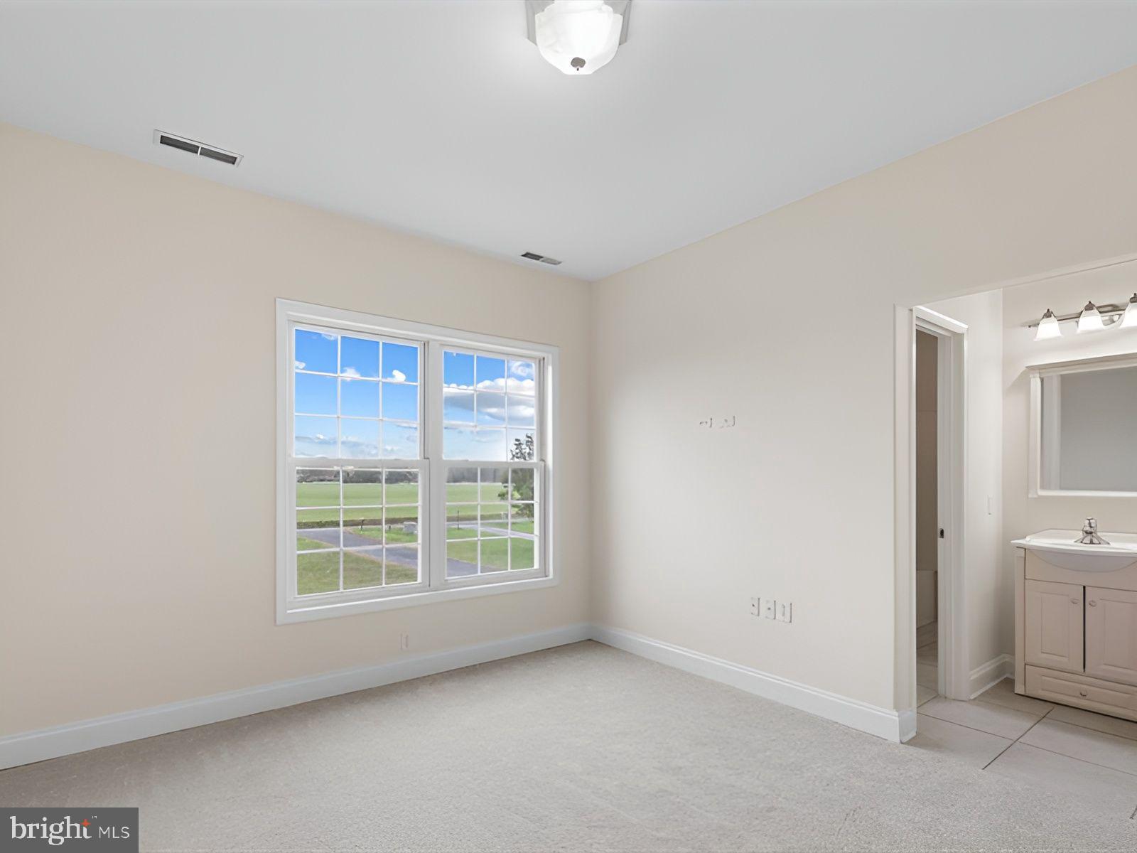 3236 Noble Farm Road Eden, MD 21822 - Photo 30 of 57 a view of an empty room with a window