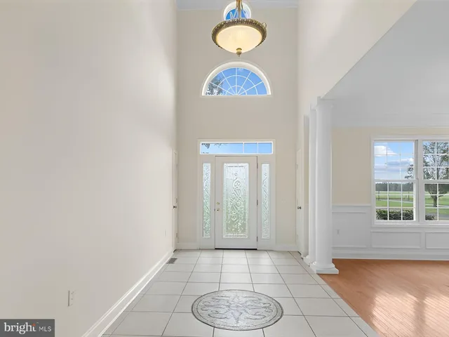 a view of a hallway with entryway