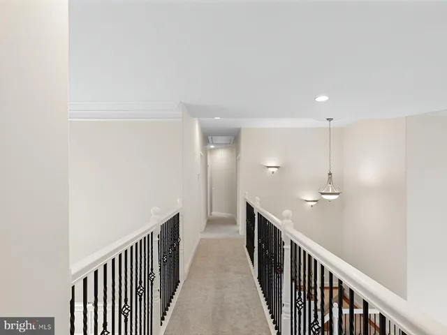 a view of a big yard with a house in the background