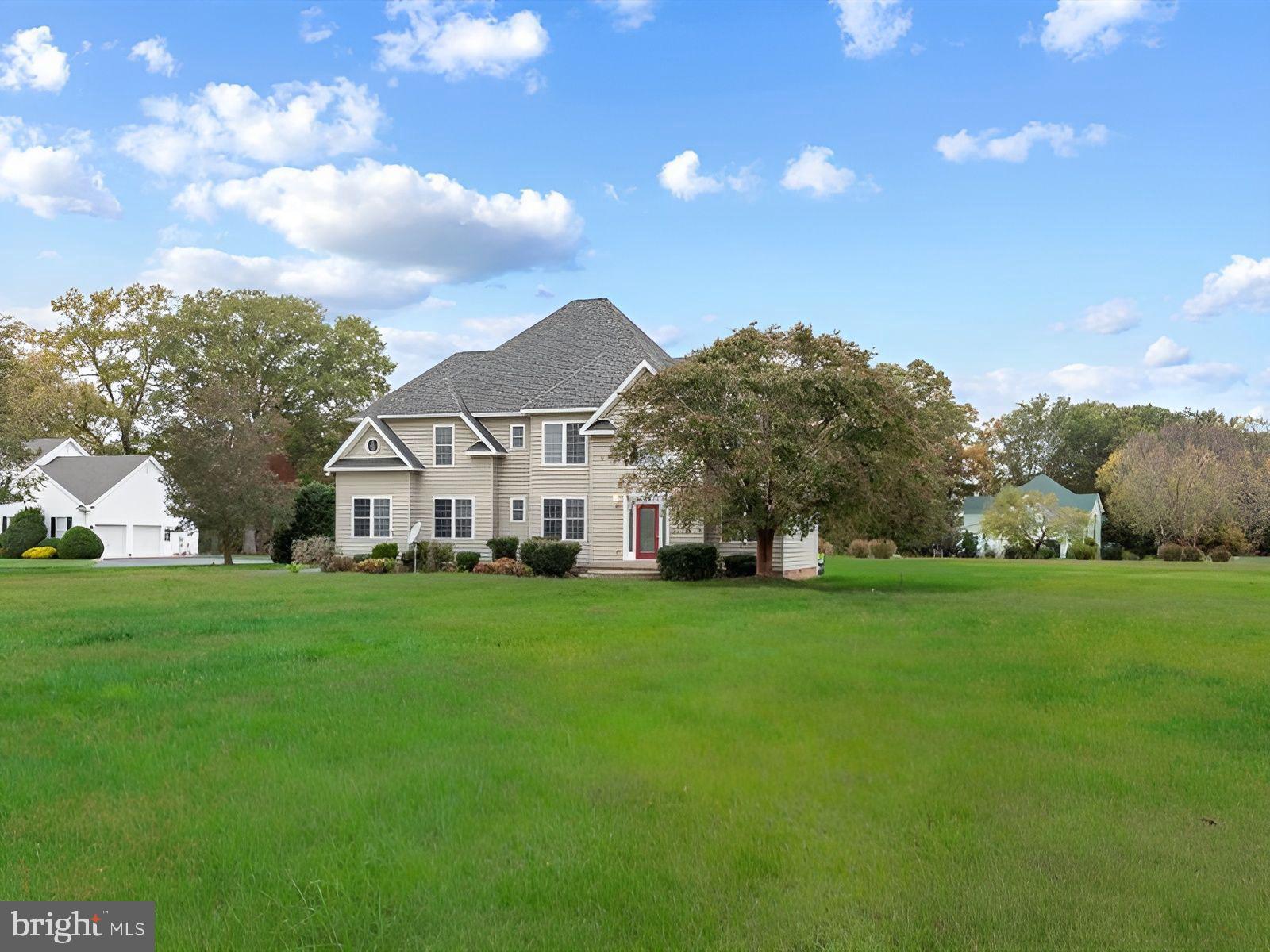 3236 Noble Farm Road Eden, MD 21822 - Photo 54 of 57 a view of a big yard with a house in the background
