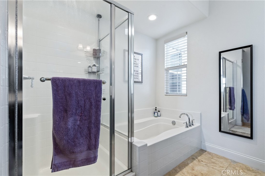 9354 Riberena Circle Atascadero, CA 93422 - Photo 37 of 47 a bathroom with a bathtub and a shower