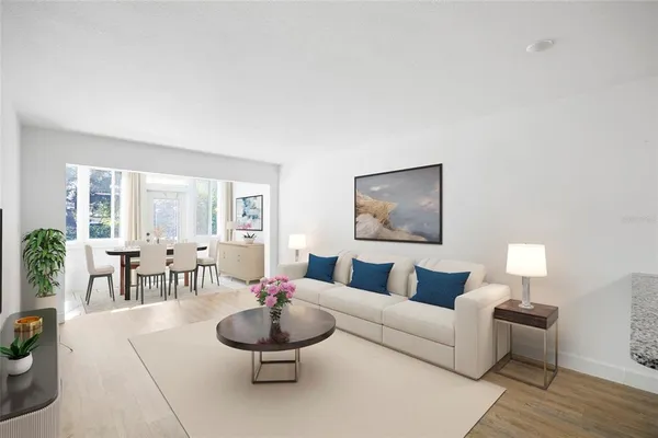 a living room with furniture and a table