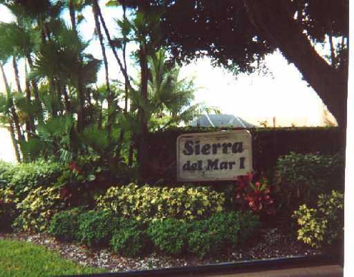 7516 West Sierra Drive Boca Raton, FL 33433 - Photo 3 of 3 a sign on the side of the road