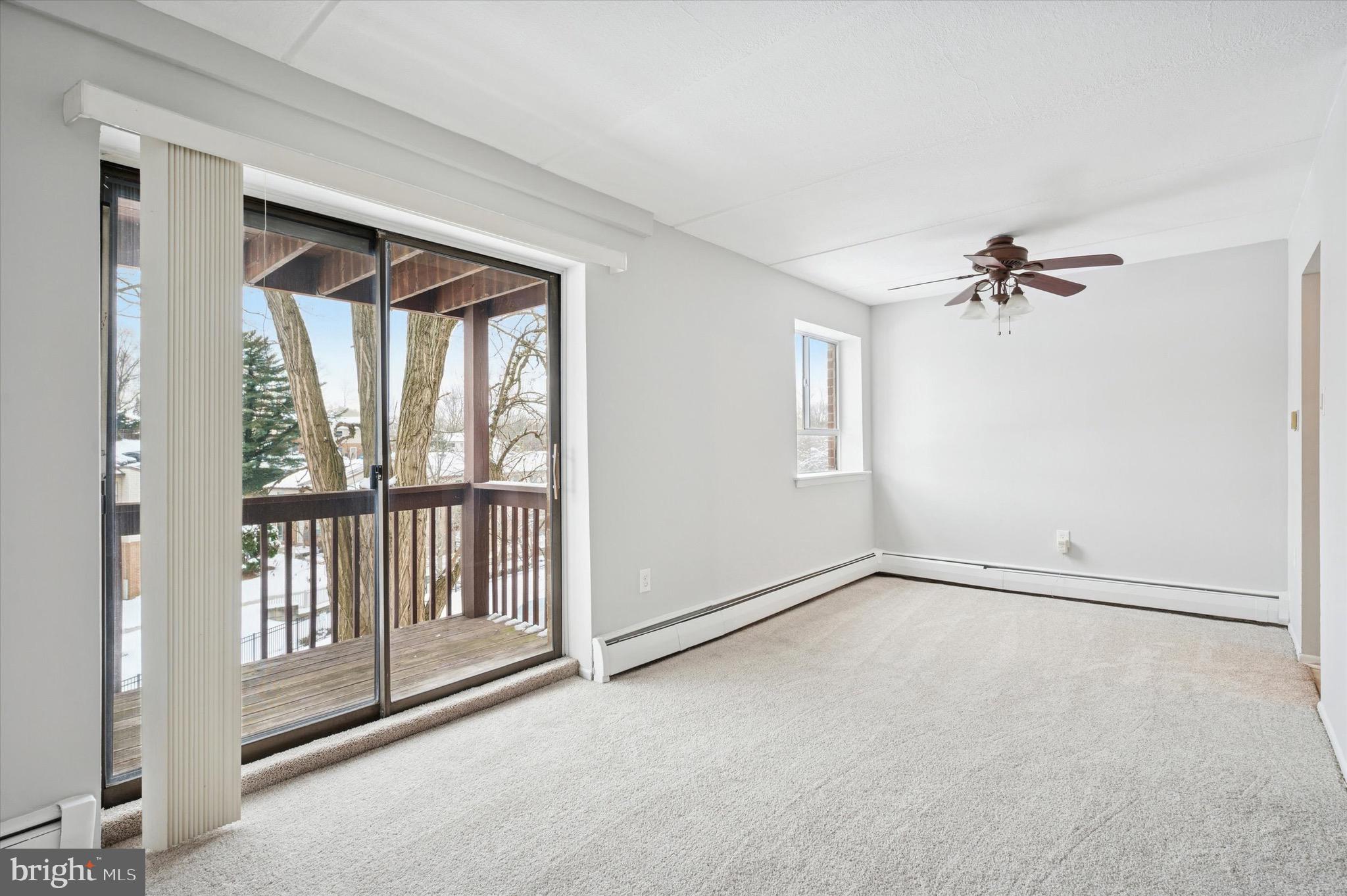 280 Bridgewater Road, Unit C7 Brookhaven, PA 19015 - Photo 8 of 20 Dining space flows beautifully out to deck