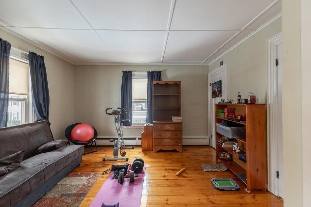 20 Washington Street Danvers, MA 01923 - Photo 23 of 39 a living room with furniture and a wooden floor