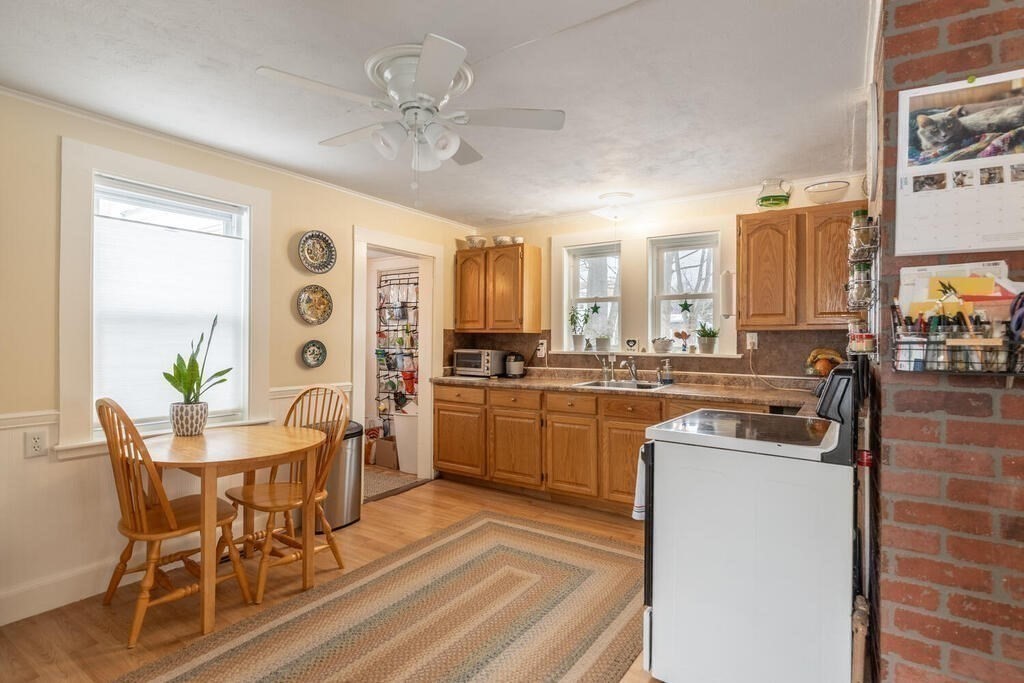 20 Washington Street Danvers, MA 01923 - Photo 29 of 39 a kitchen with a sink cabinets and window
