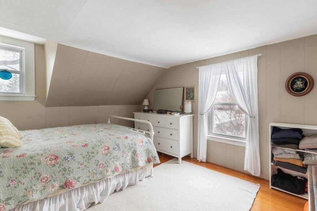 20 Washington Street Danvers, MA 01923 - Photo 33 of 39 a bedroom with a bed and a window