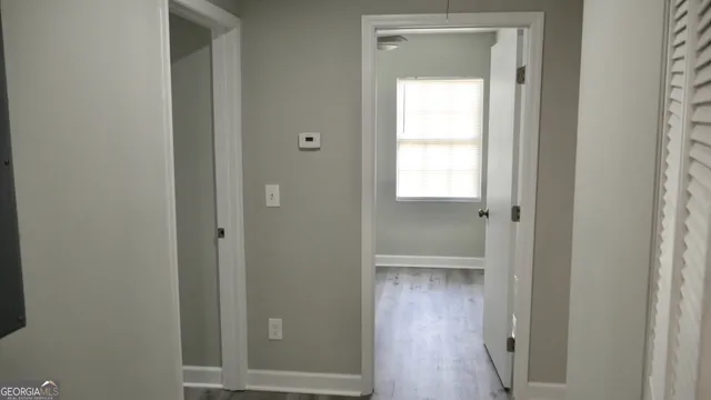 a view of a bathroom with a glass door